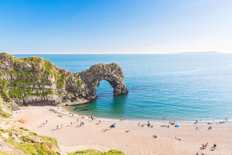 Pranoramic view of Durdle Door and seaside. Famous rock arch in the Jurassic coast, Dorset, England.