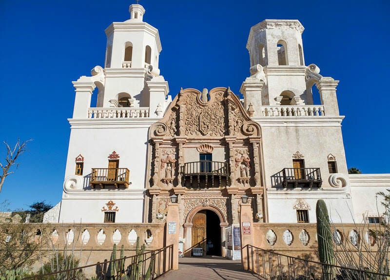 white facade and towers of Mission San Xavier Del Bac