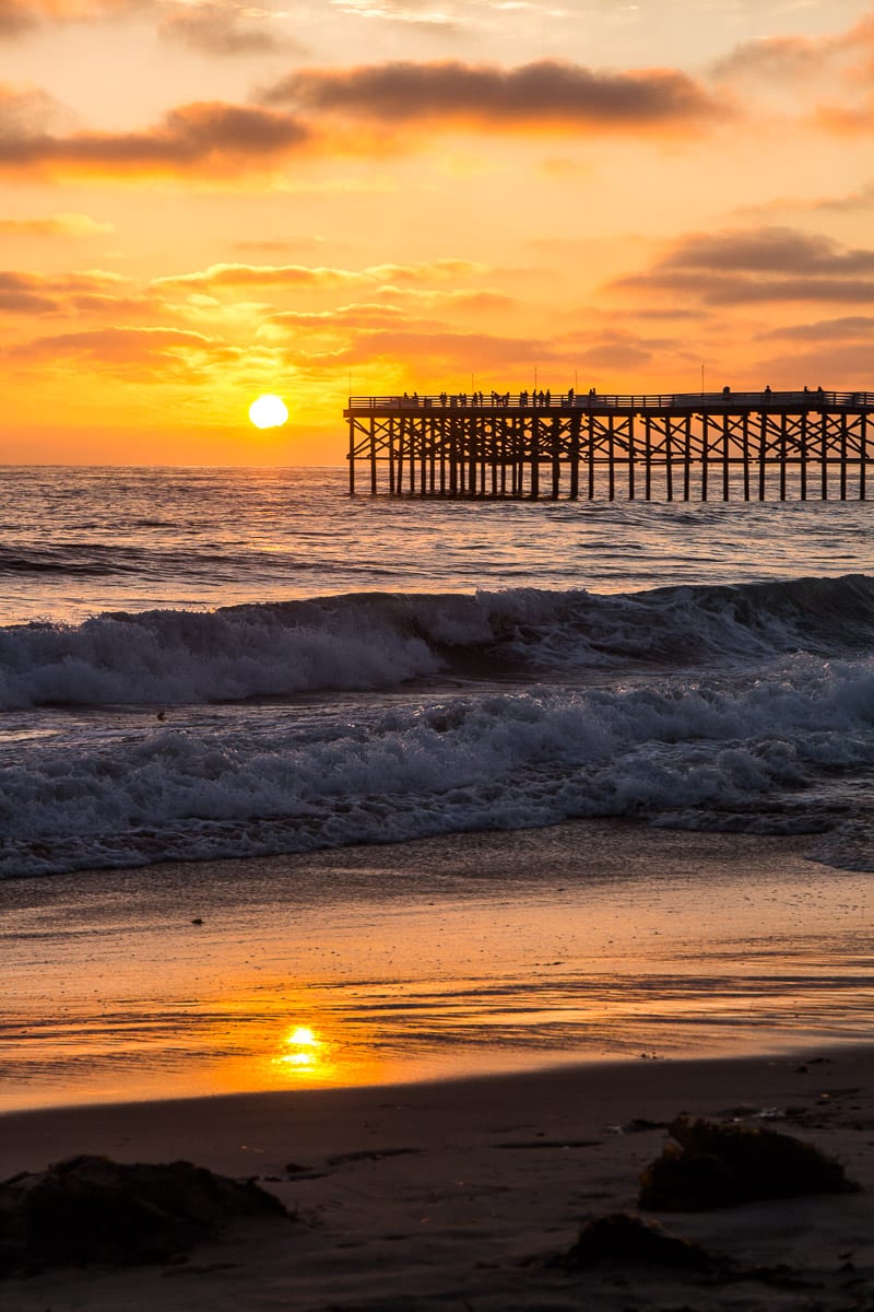 A sunset over a beach 