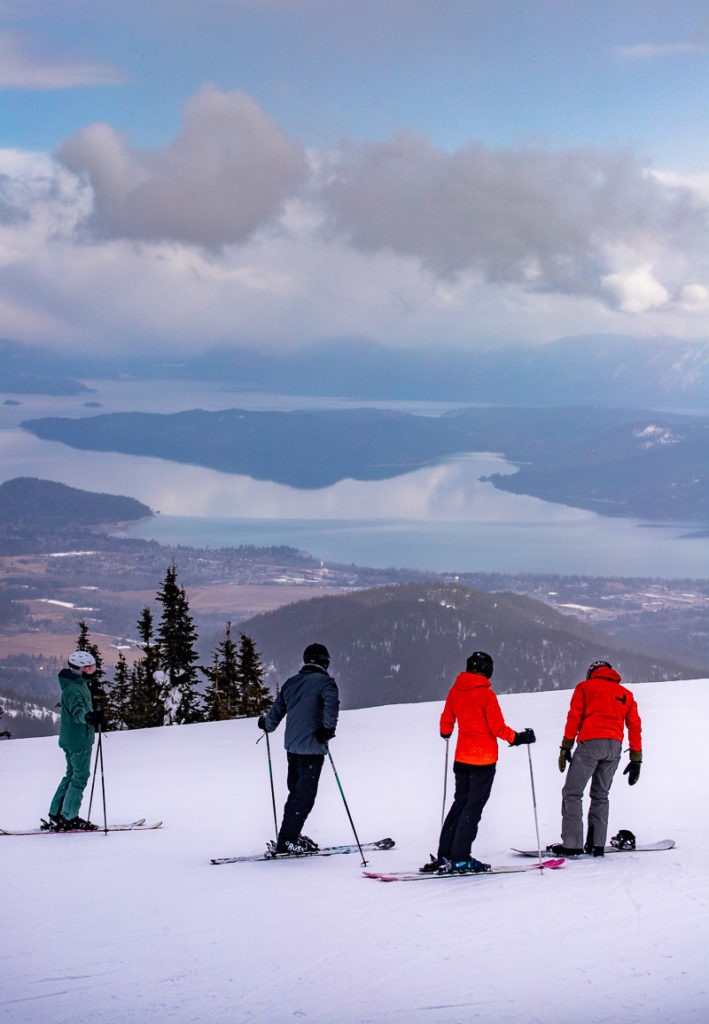 Skiers about to take on a Black run at Schweitzer