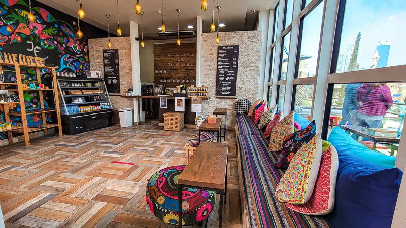 upstairs cafe with small tables and chairs