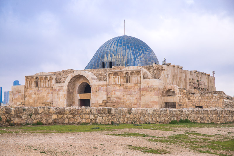 ancient brick building with blue dome