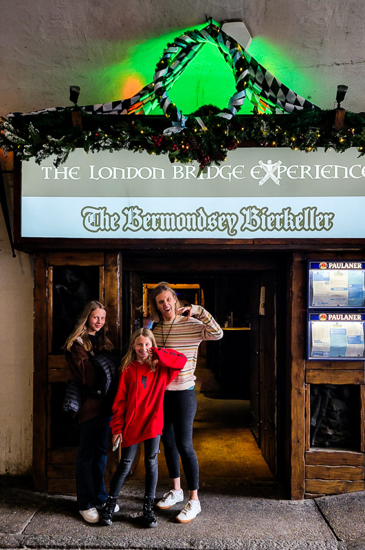 family posing outside london bridge experience 