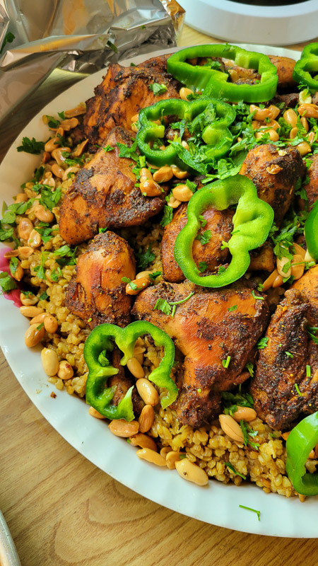 plate of chicken and freekah