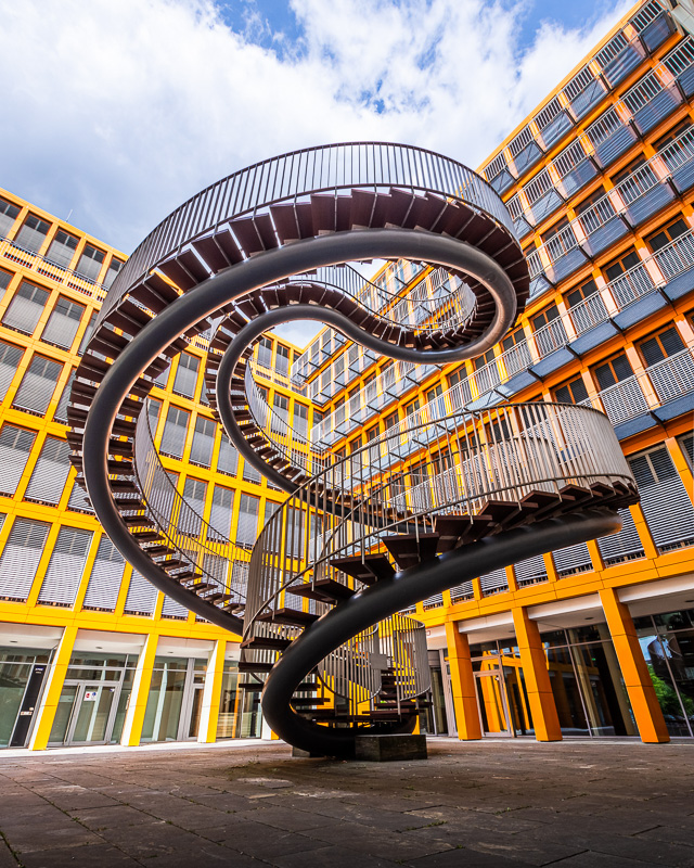 a stairway sculpture twisting around in a circle going nowhere