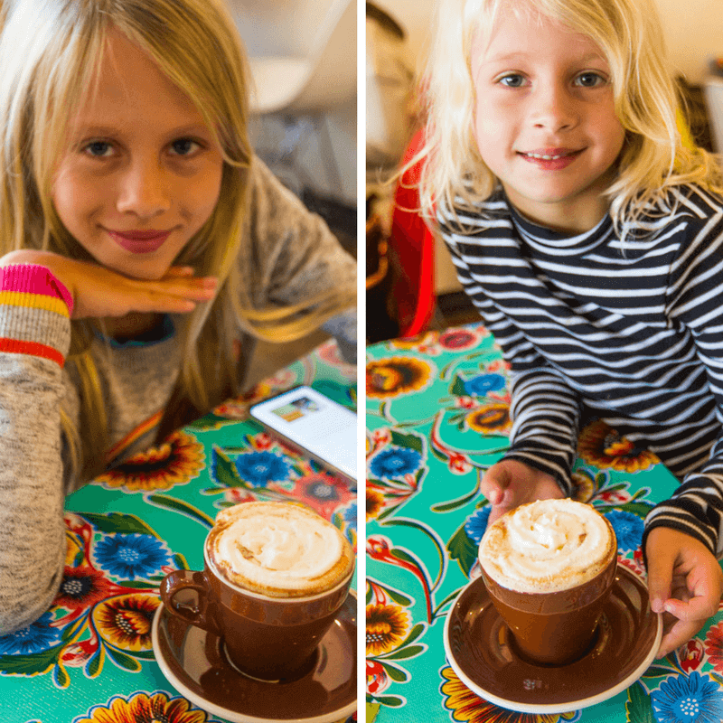 girls holding hot chocolate