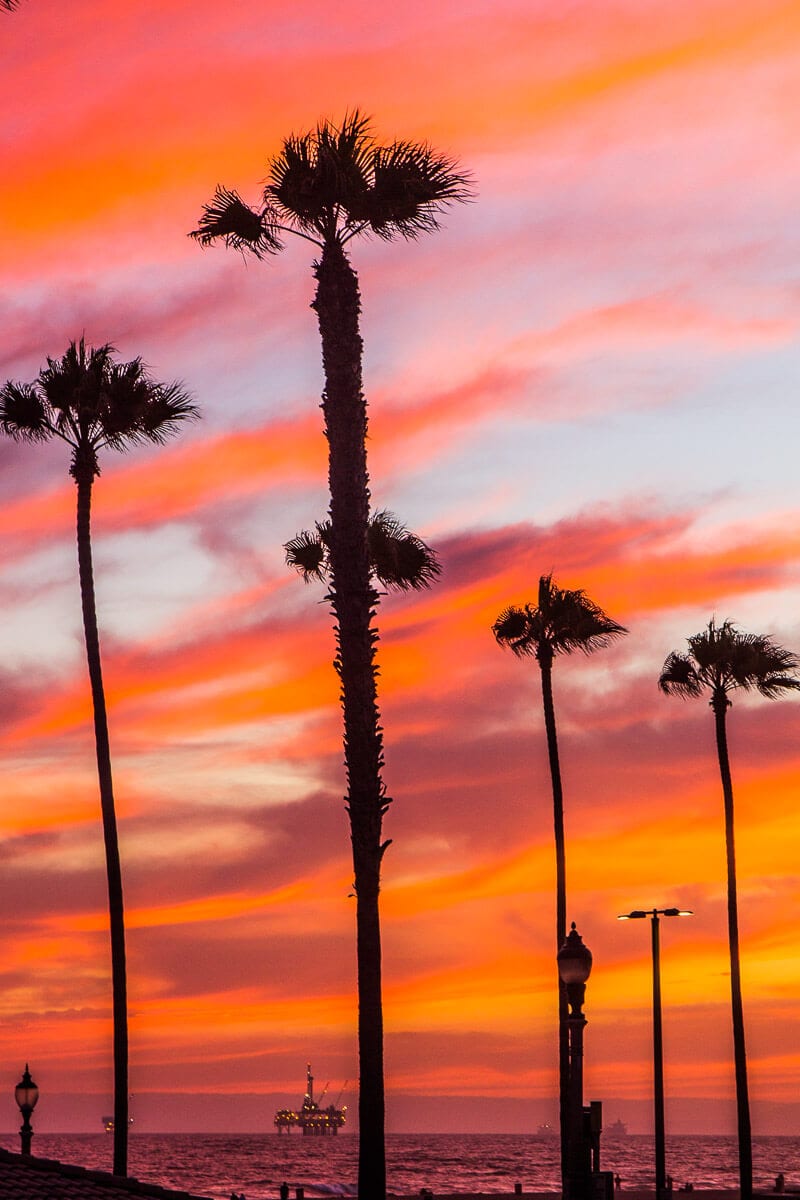 Sunset in Huntington Beach, California. One of the best places to visit in California and watch the sunset