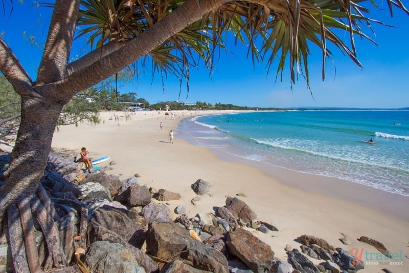 view of curving white sand Noosa Main Beach