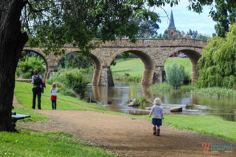 people looking at historic brick Richmond, bridge