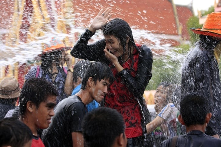 woman getting splashed with water