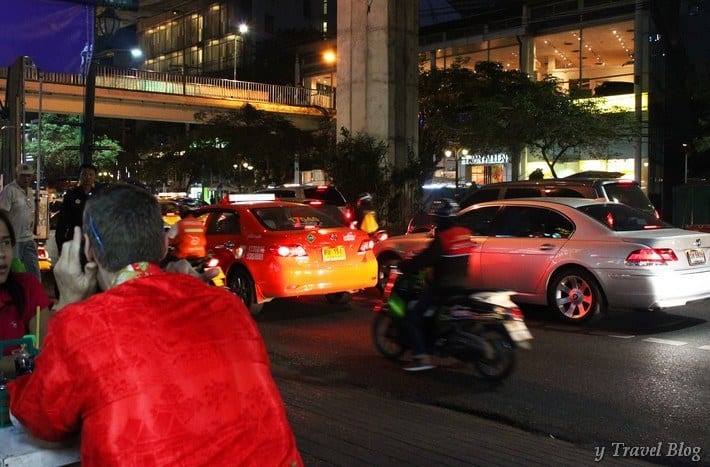 cars and motorbikes driving on the road