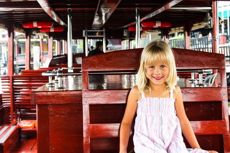 girl sitting on boat