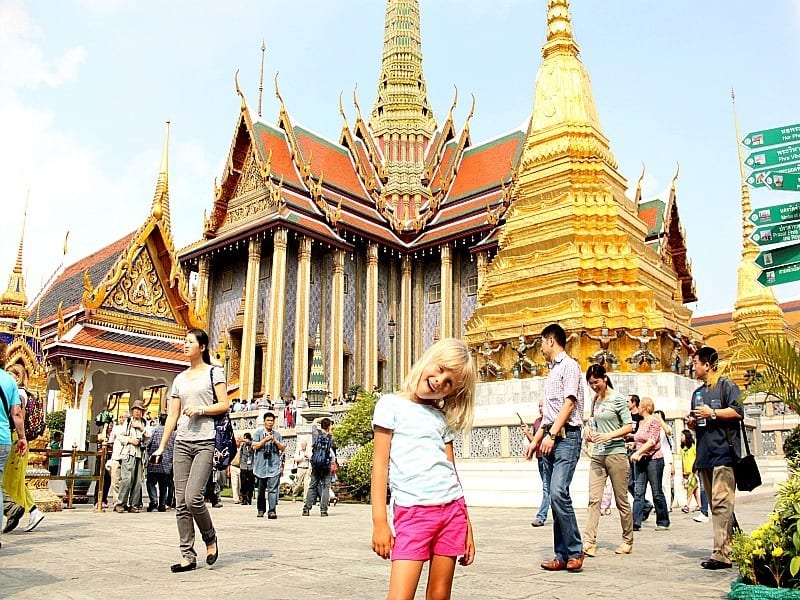 girl standing out the front of Grand palace Bangkok