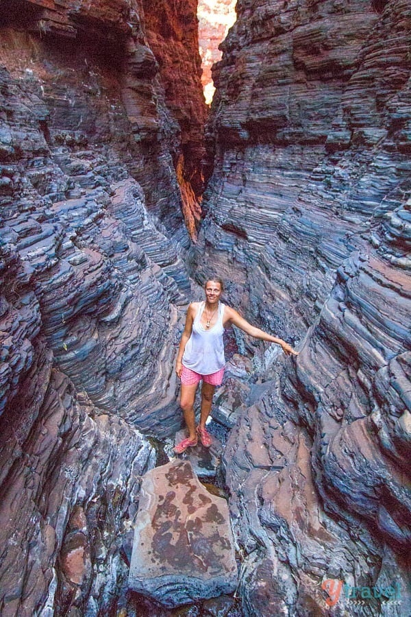 woman standing in a canyon