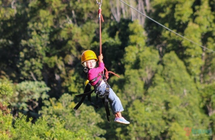 little girl zip lining