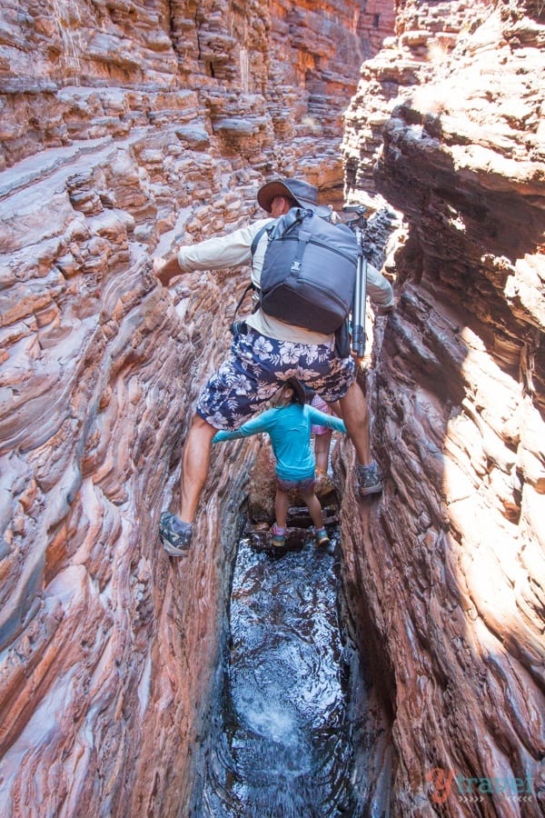 people climbing up rocks