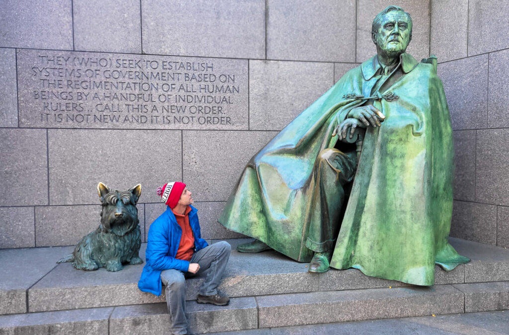 Man looking up at the Thomas Jefferson Monument in DC