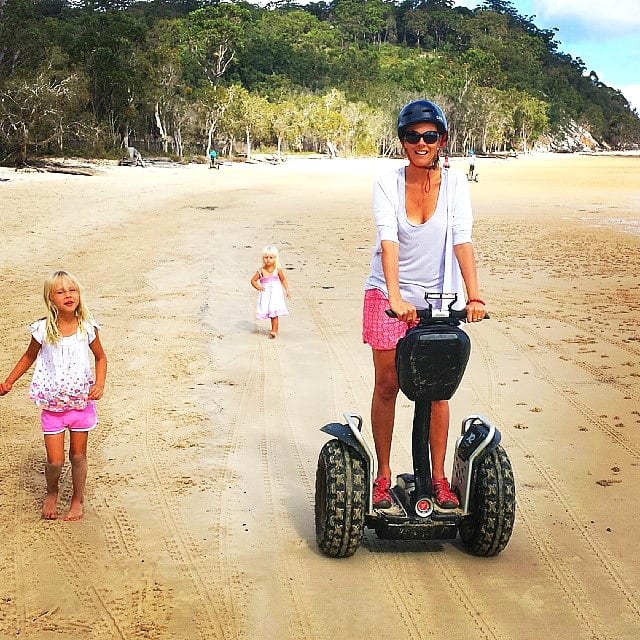 woman riding a Segway on the beach