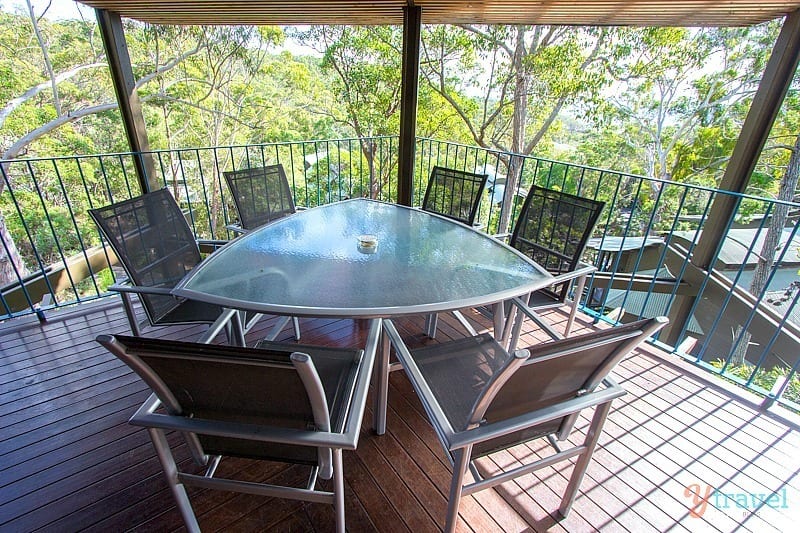 A dining room table on a balcony