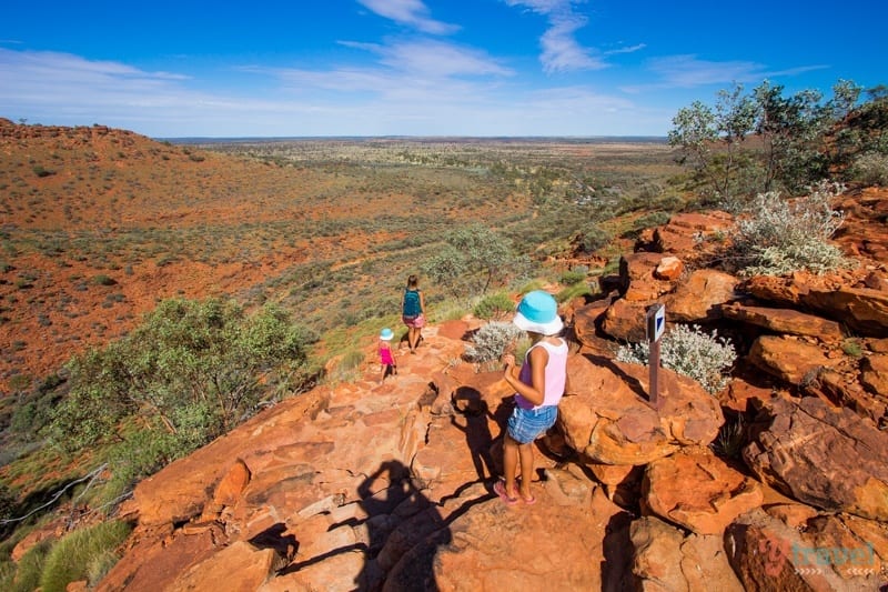 people walking down into a canyon