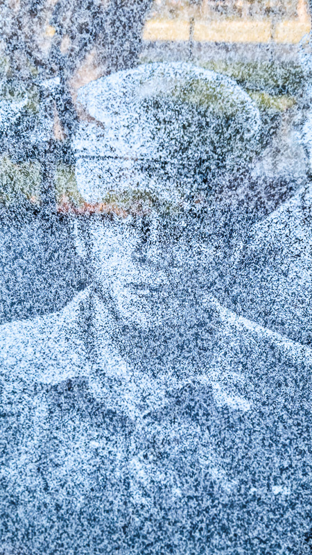 photograph of soldier etched into wall at Korean Veterans Memoral DC