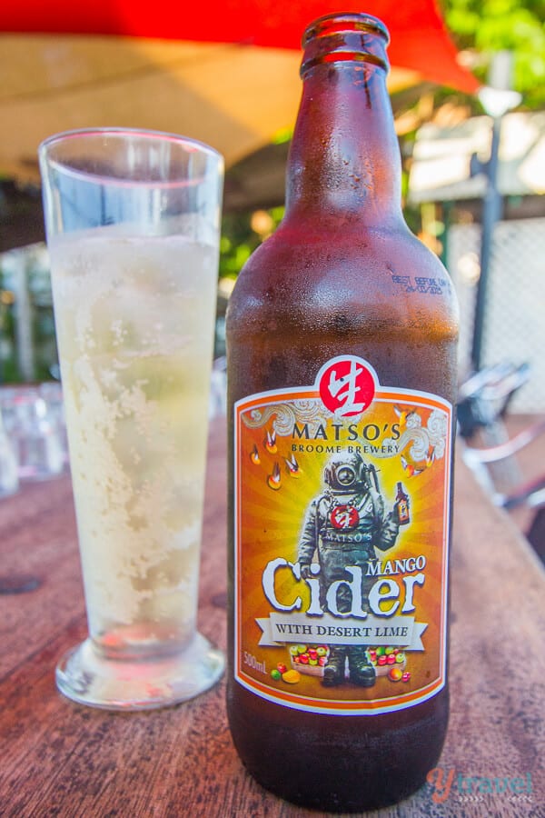 mango cider on table