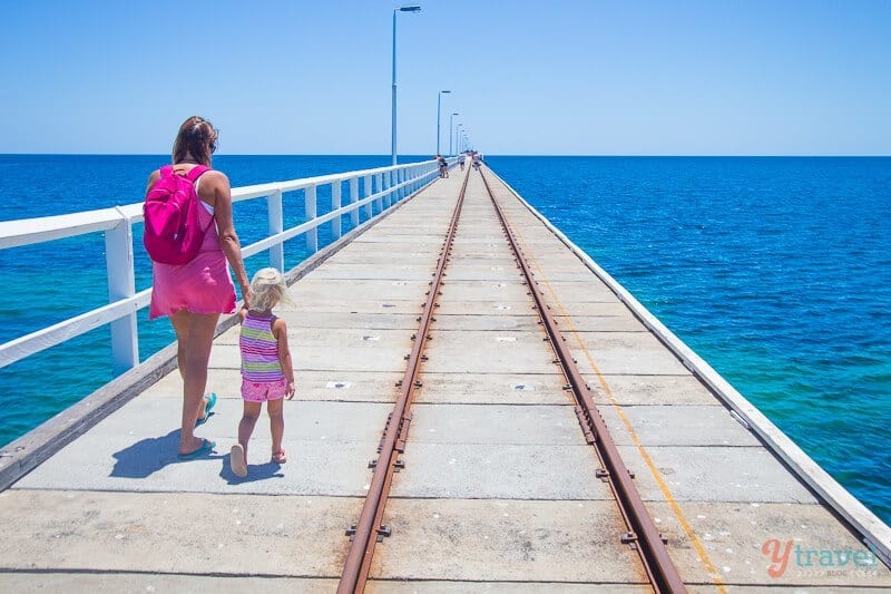 woman and child walking down Busselton Jetty 