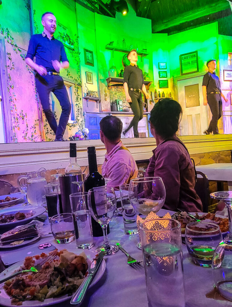 Irish dancers performing on a stage