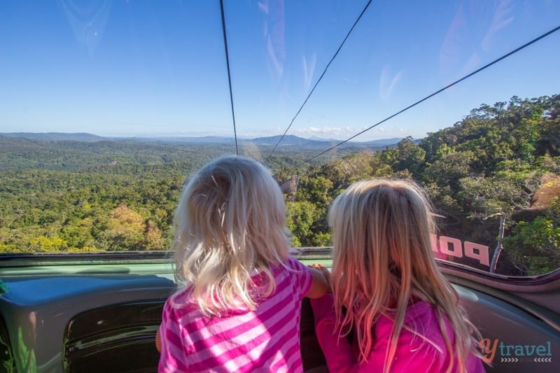 girls sitting in a gondola 