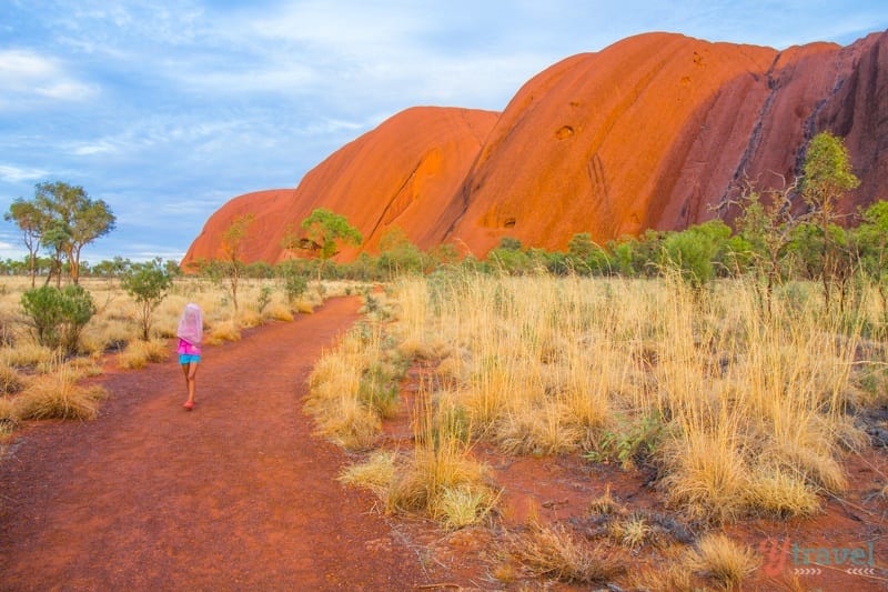 kalyra walking a trail next to the Uluru