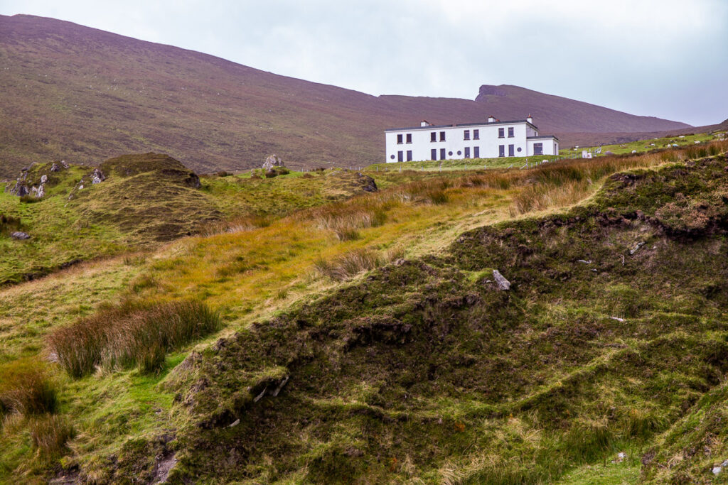 A building perched up high on a cliff