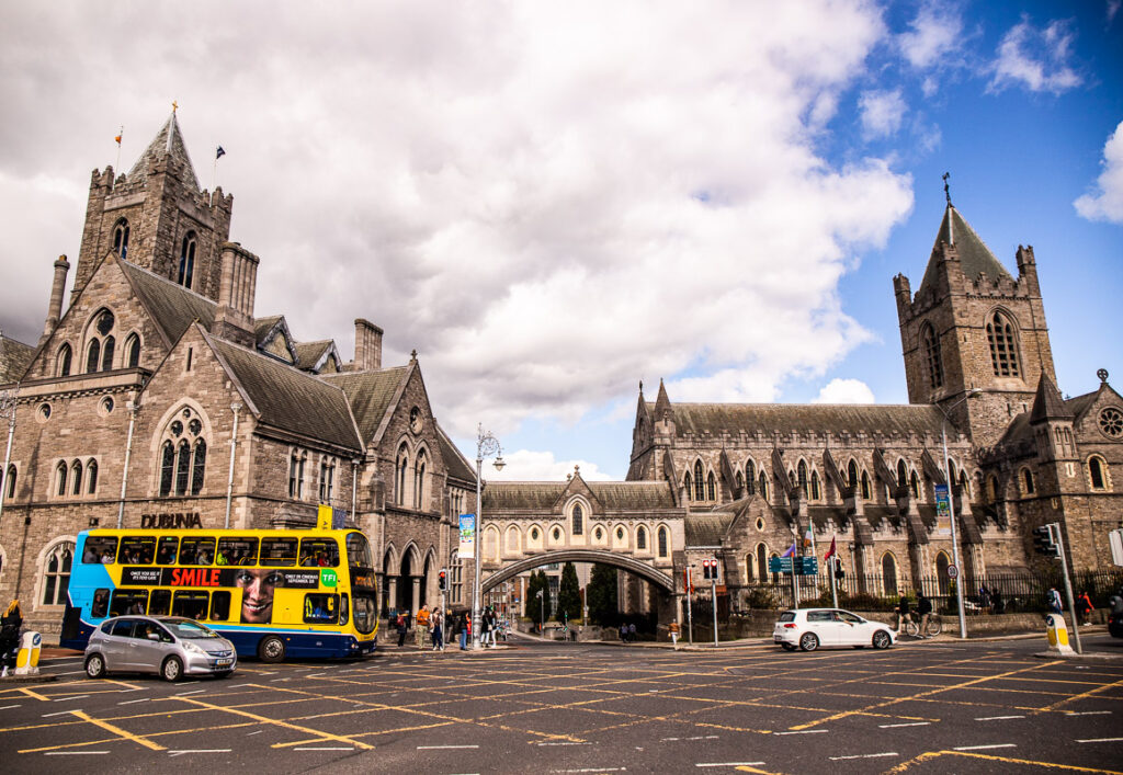 Bus passing by a large church