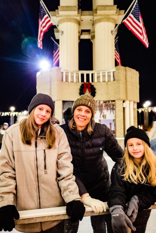 Mom and daughters ice skating photo