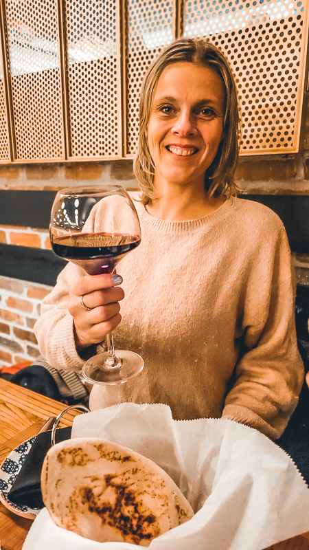 lady drinking a lebanese syrah