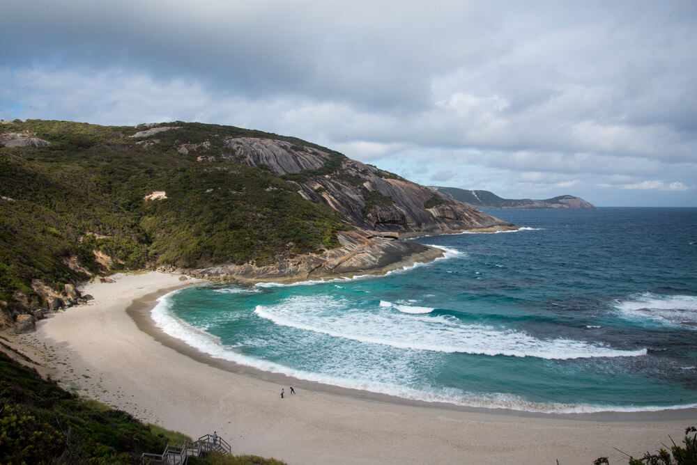 isloated cove with waves rolling in