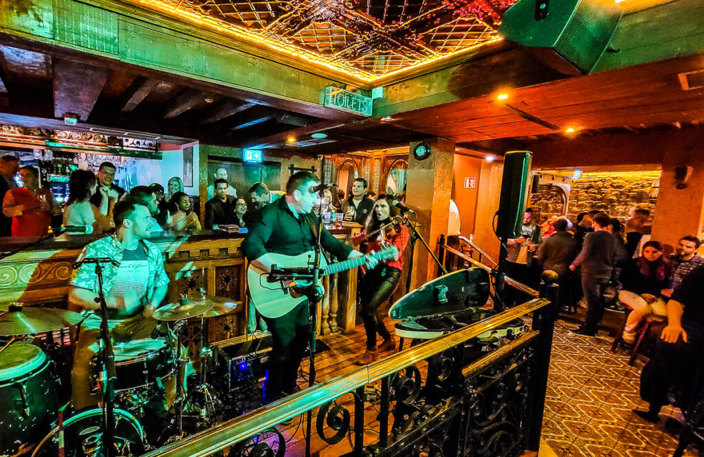 Traditional Irish musicians playing in a pub