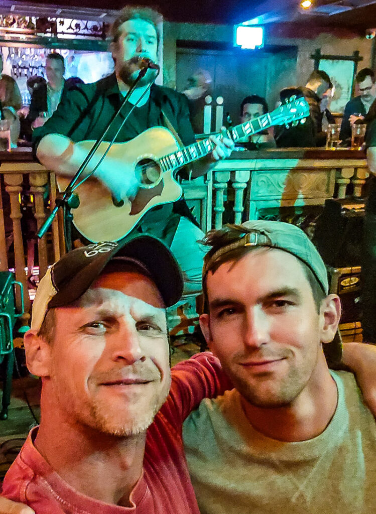 Two guys having beers in a pub