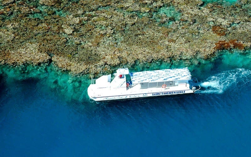 boat on the edge of the reef