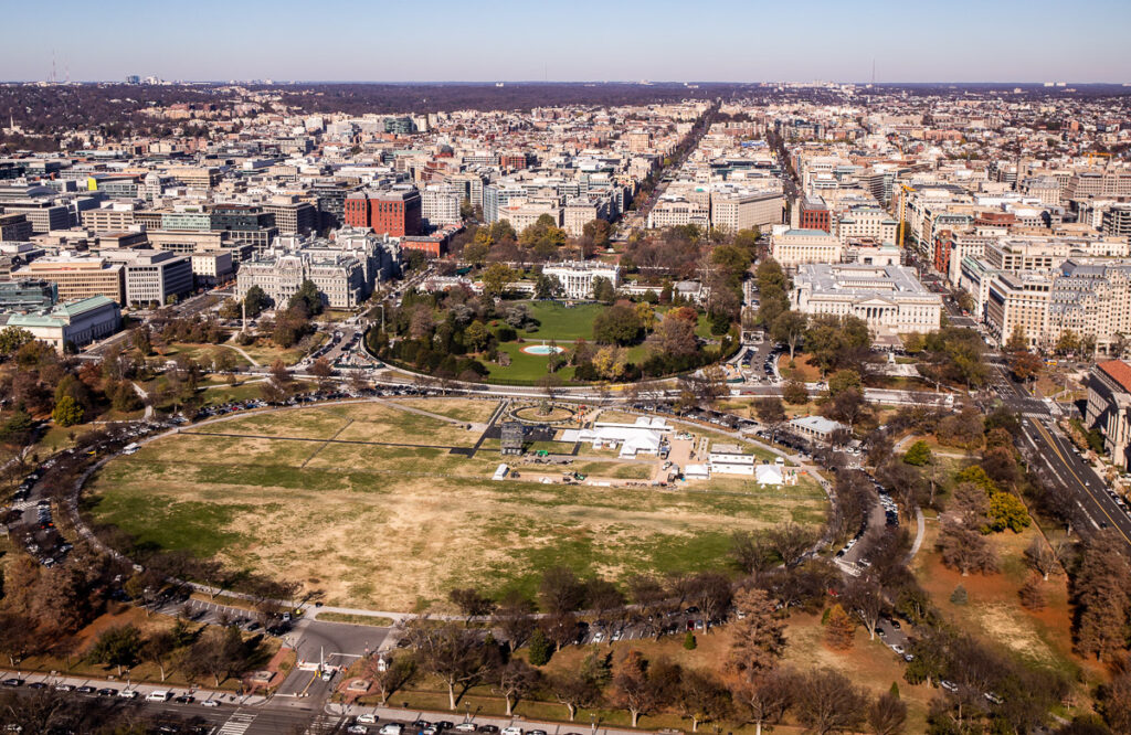 Aerial view of a large green park and buildings in Washington DC