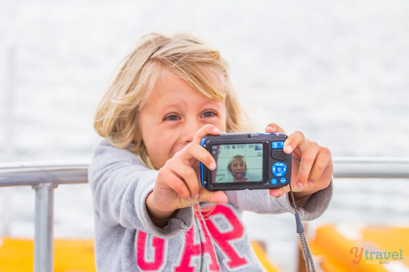 girl holding a camera