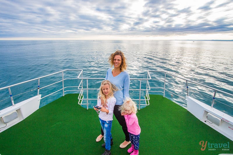 people standing on a boat