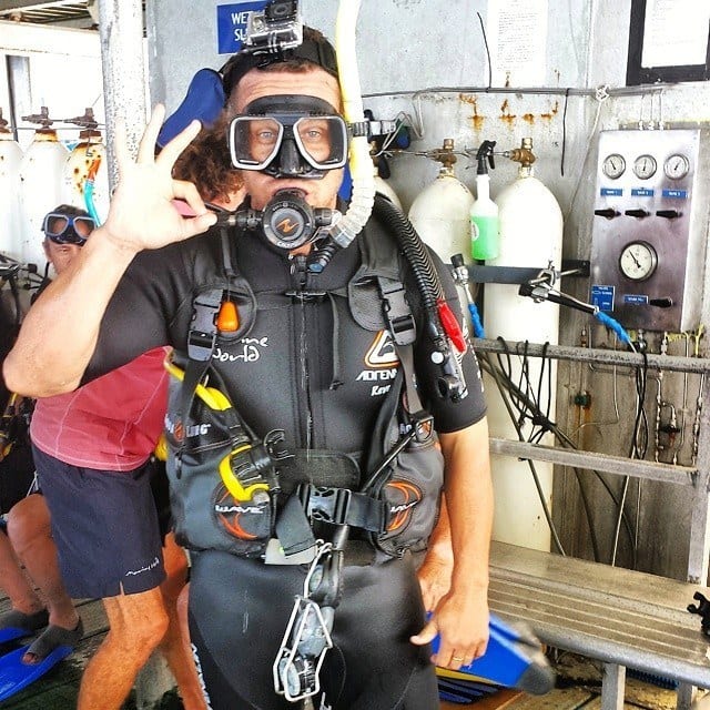 man in scuba gear ready to dive