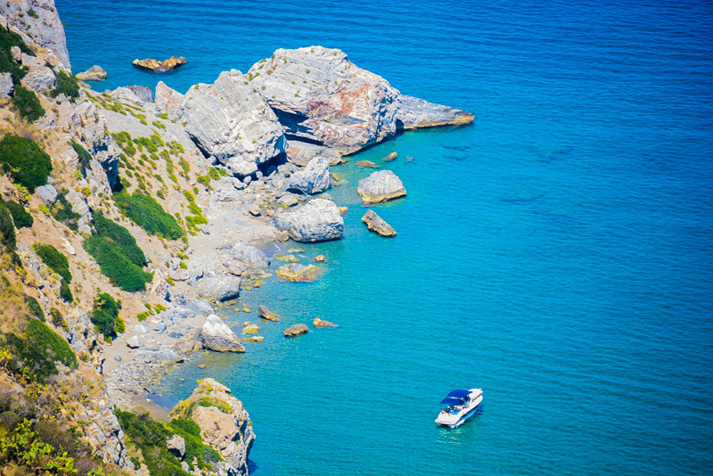 azure blue waters along the rugged coast