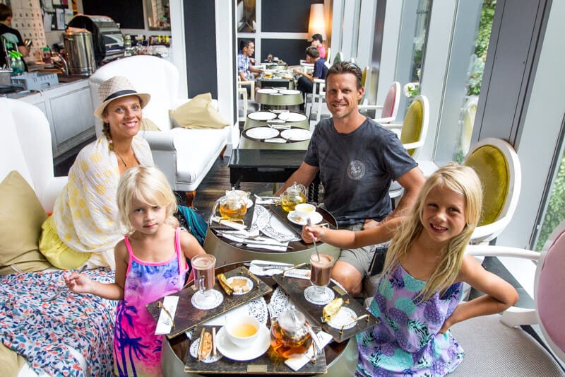 family having afternoon tea Arteastiq boutique Tea House in Singapore 