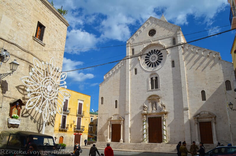 A church with a clock at the top of a building