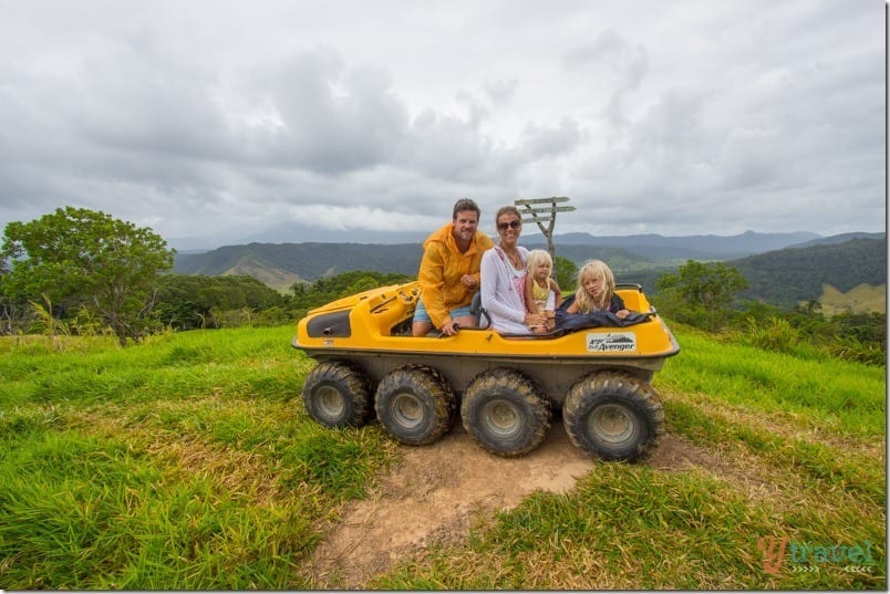 family sitting in yellow ARgo tours