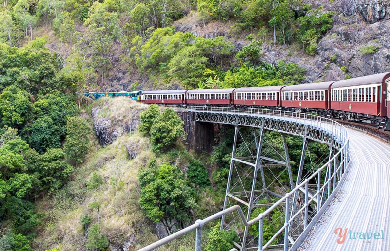 Kuranda Scenic Railway driving on train line through mountains