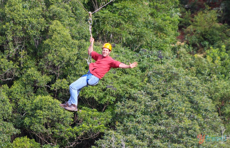 man on zipline O'Reilley's Rainforest Retreat