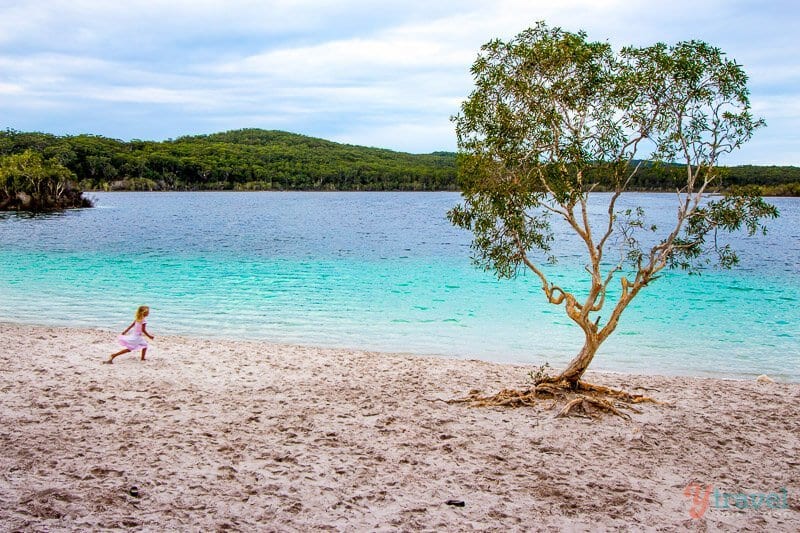 girl running on beach at Lake Mackenzie 