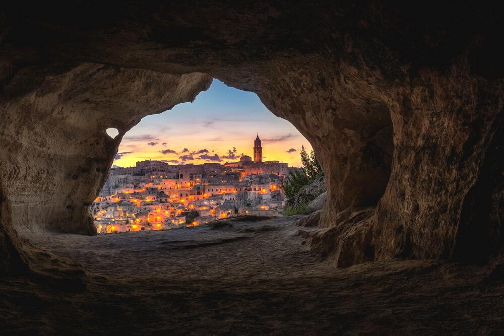 buildings seen through cave window